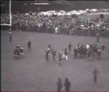 The crowd runs onto the pitch at Rodney Parade as Newport beats the All Blacks in 1963