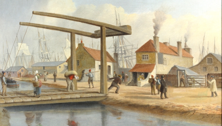 The canal ran alongside the river, making it easy to transfer cargoes from barge to ship.